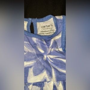 Worn Once. Newborn baby girl. The colors are blue and white.